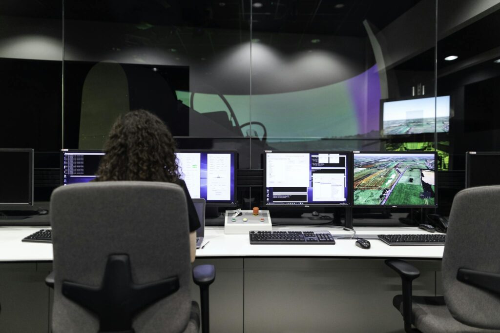 Female Engineer Controlling Flight Simulator